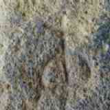 figura grabada en dólmen de Menga